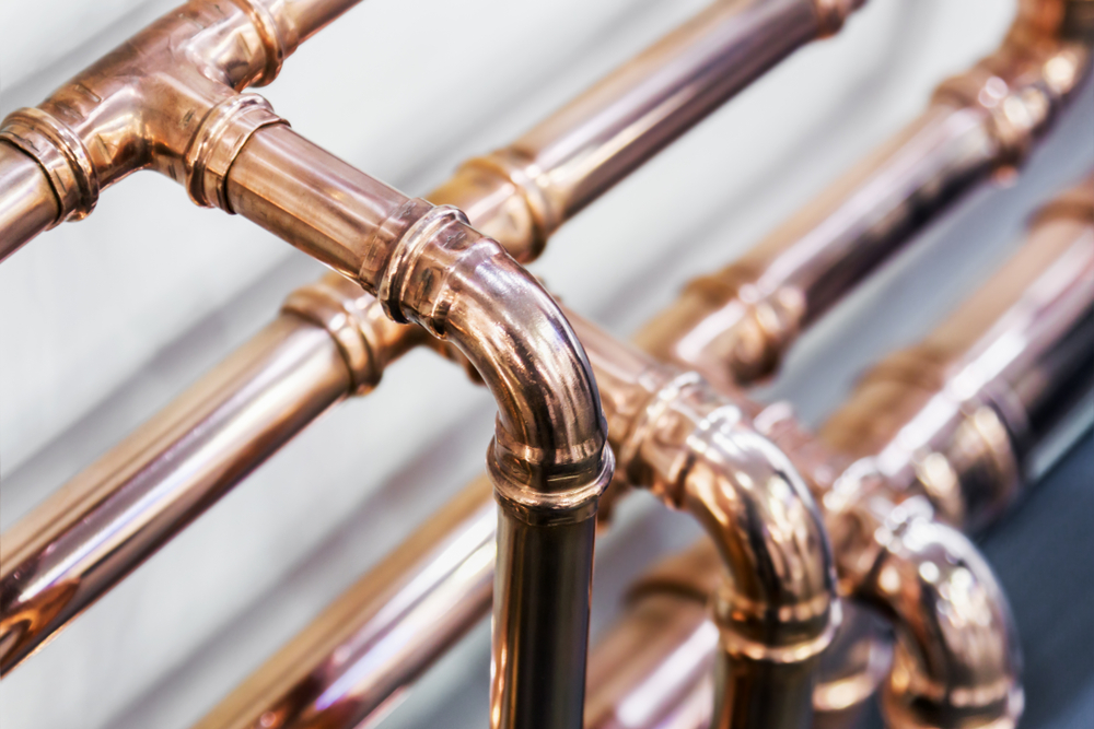 A closeup shot of copper plumbing pipes