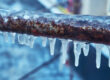 A closeup shot of a plumbing pipe that has been frozen over